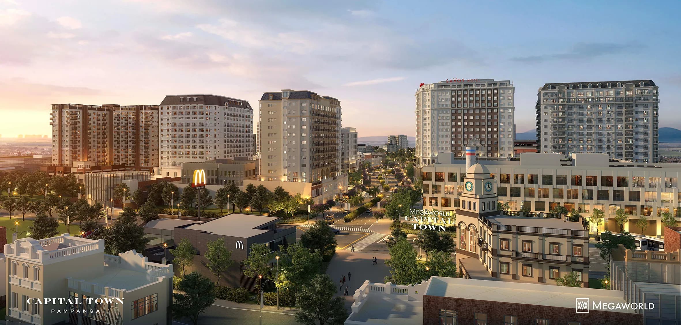 Aerial render of the Capital Town Pampanga master-planned township at dusk, showing residential towers, tree-lined boulevards, and the Savoy Hotel